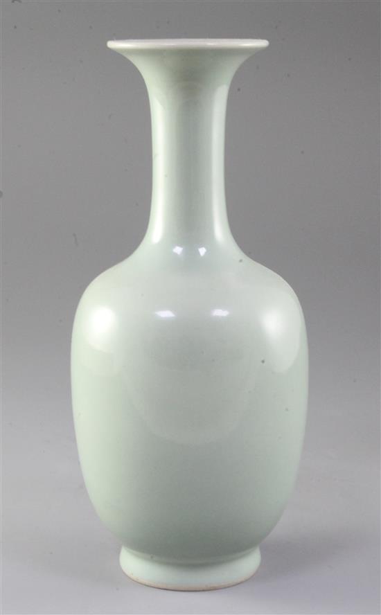 A Chinese celadon ground bottle vase, 19th century, height 26cm